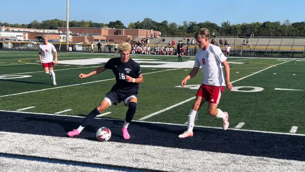 Howell senior Tye Maser defended by Ocean senior Evan Moran. (Image: Matt Manley)