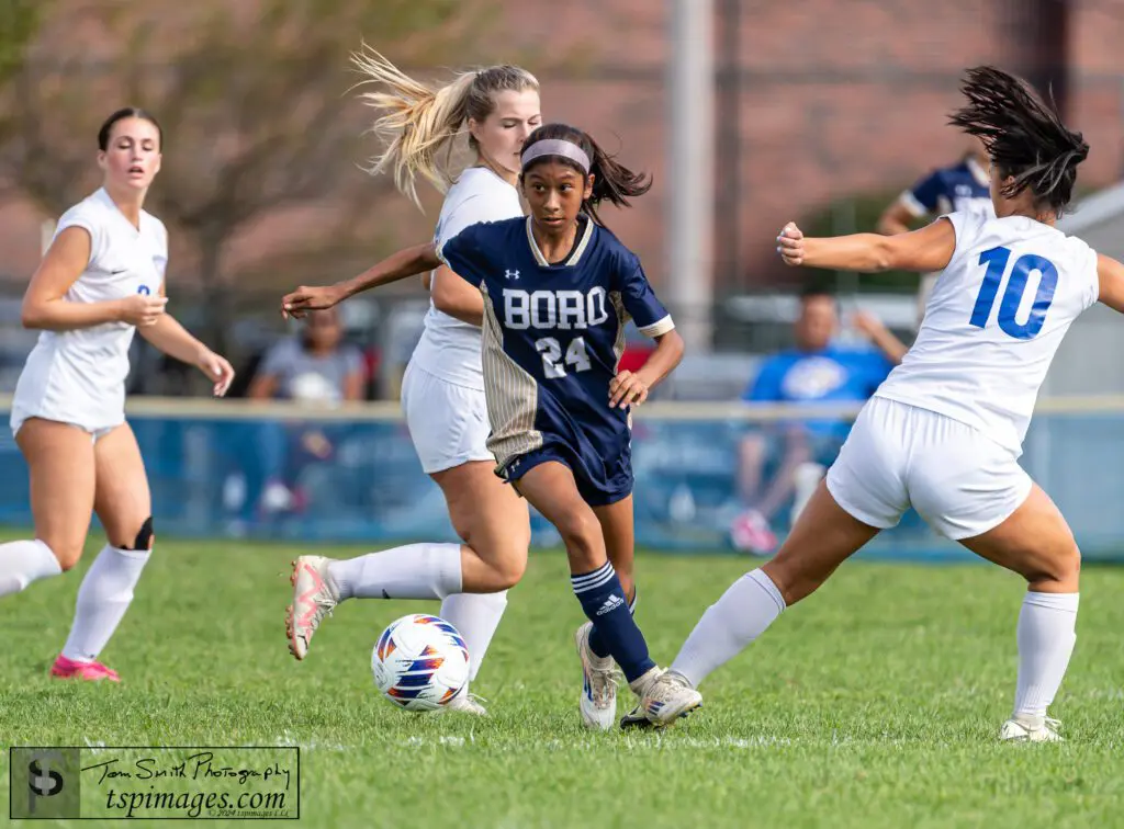 Freshman Alison Espinoza attacks the Holmdel defense. (Photo by Tom Smith)