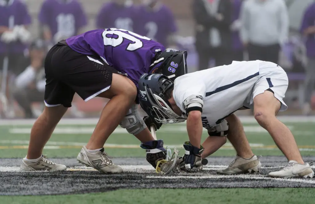 Rumson-Fair Haven freshman Jaden Cavise went 11-for-14 on face-offs to help the Bulldogs rally for a 10-8 win over Manasquan. (Bob Badders | rpbphotography.com)