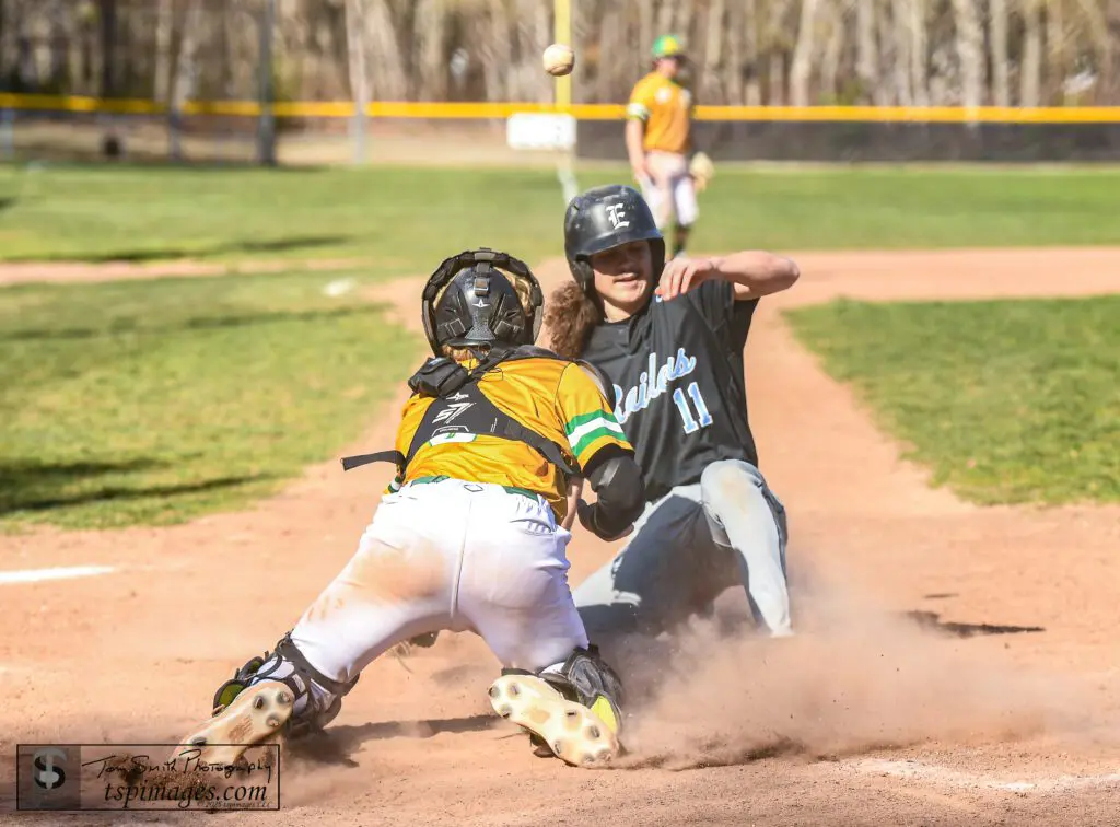 Toms River East senior Gavin Toth slides into home past Brick Memorial catcher Joe McGlynn. (Photo: Tom Smith | tspsportsimages.com)