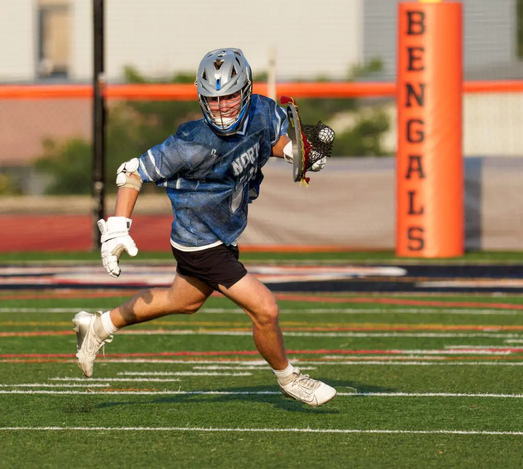 Shore Conference Boys Lacrosse Senior All-Star Game, June 12, 2025 - Shore Sports Insider Holmdel FOGO Jack Powers borrowed a goalie stick for a face-off win, and later a goal. (Bob Badders | rpbphotography.com) - Shore Conference Boys Lacrosse Senior All-Star Game, June 12, 2025