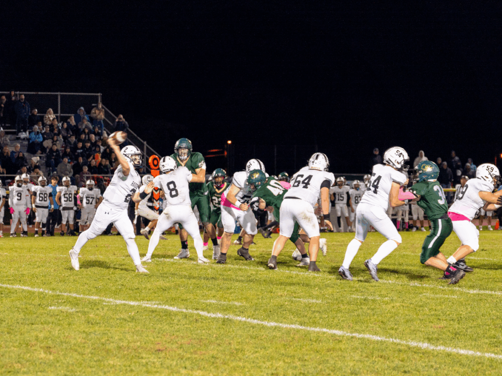 Toms River East quarterback Brayden Flanagan drops back to pass (Photo by Paul Williams/PCWImages)
