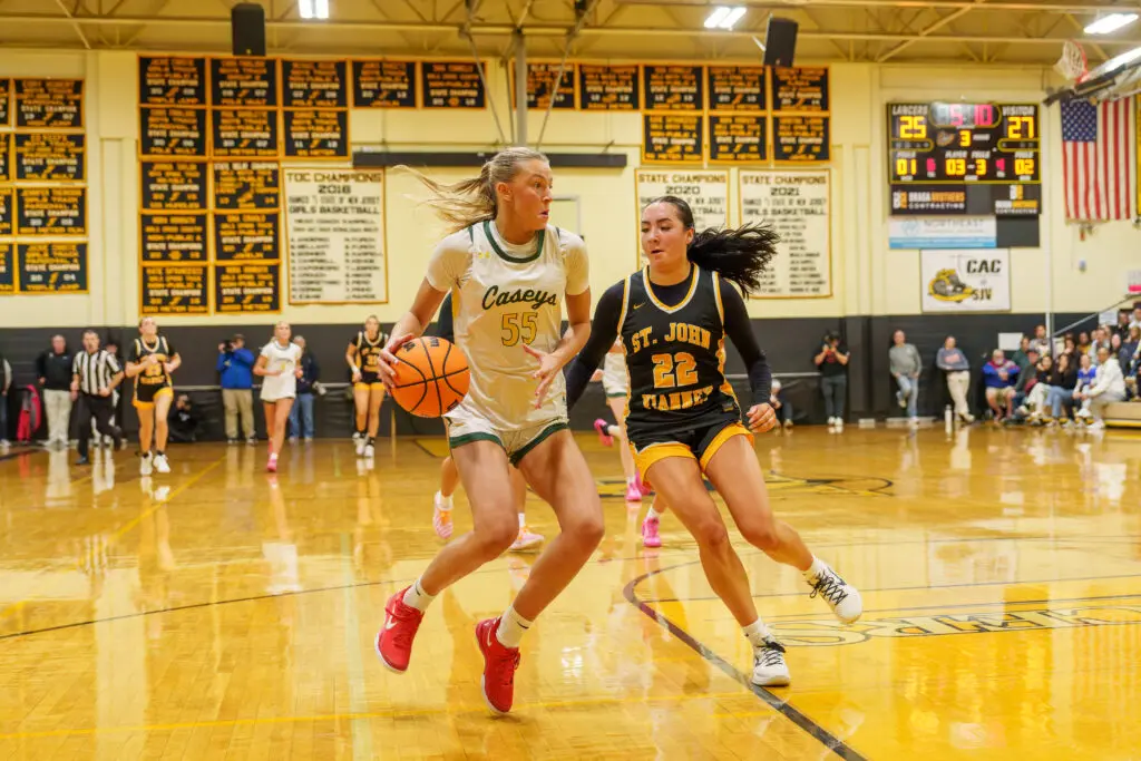 RBC's Addy Nyemchek drives to the basket against SJV's Madison Kocis