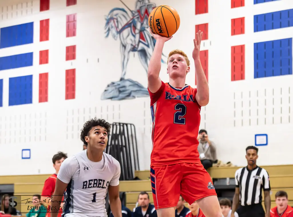 Wall senior Brian McKenna (2) gets past Howell senior Cayden Parker for a shot. (Photo: Tom Smith | tspsportsimages.com)