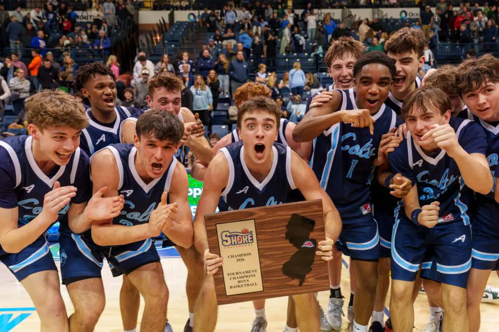 CBA senior Connor Andree holds the Shore Conference Tournament championship plaque after CBA won the 2026 championship over Red Bank Catholic. (Photo: Patrick Olivero)