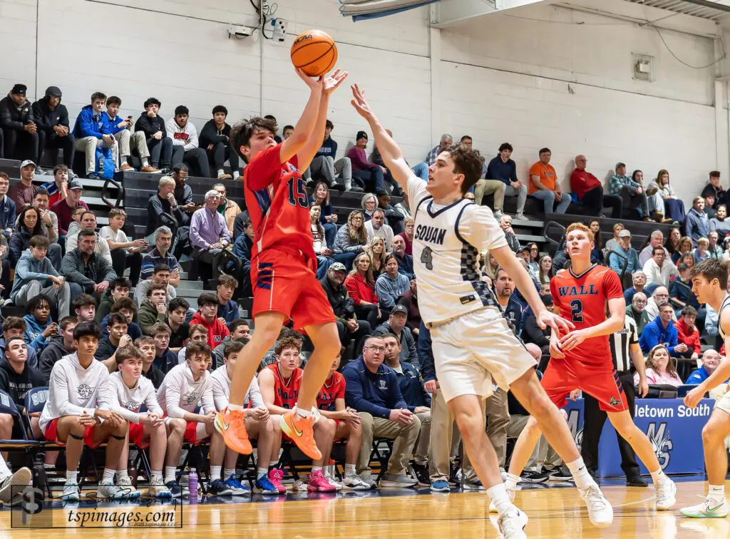 Wall senior Liam Killea shoots over Manasquan sophomore Luke Winn. (Photo: Tom Smith | tspsportsimages.com)