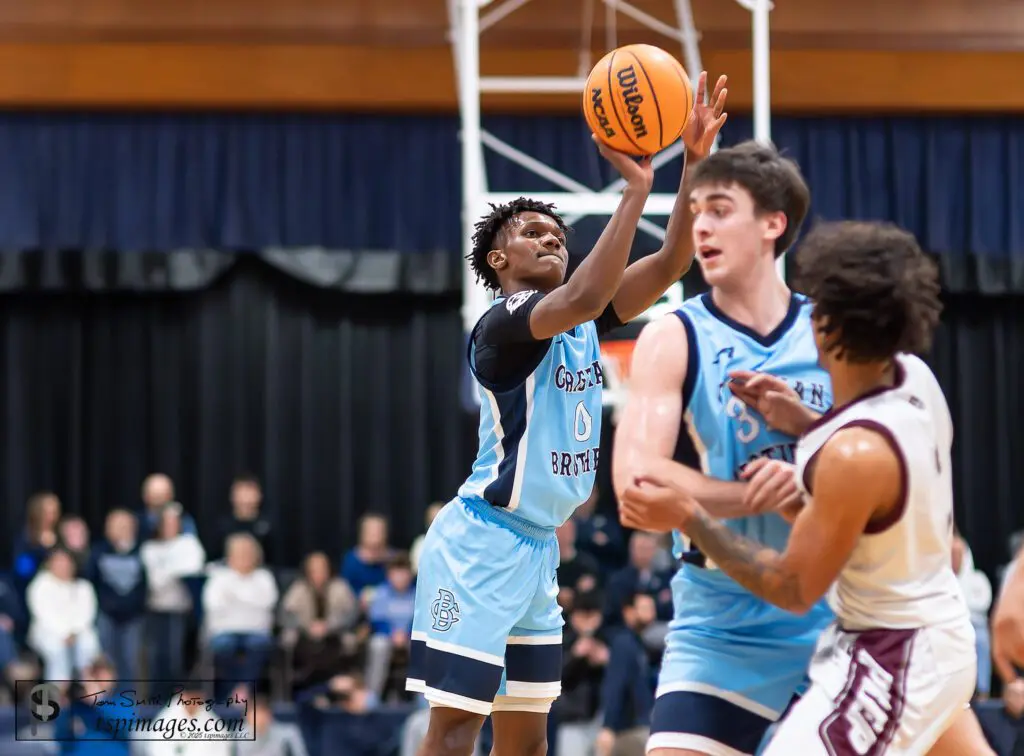 CBA sophomore Izayah Cooper shoots over s screen by senior teammate Connor Andree. (Photo: Tom Smith | tspsportsimages.com)